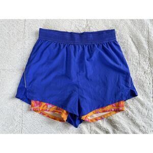 Fabletics Perforated Run 2" Shorts 2-in-1 Design Cobalt Purple Orange Medium